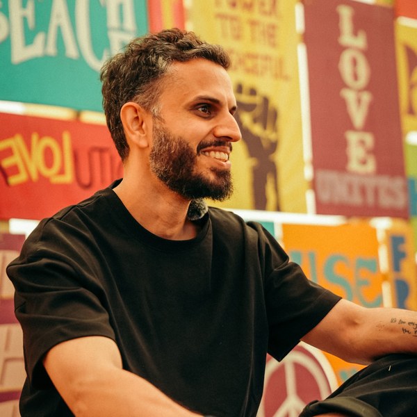 Jay Mistry, smiling in conversation